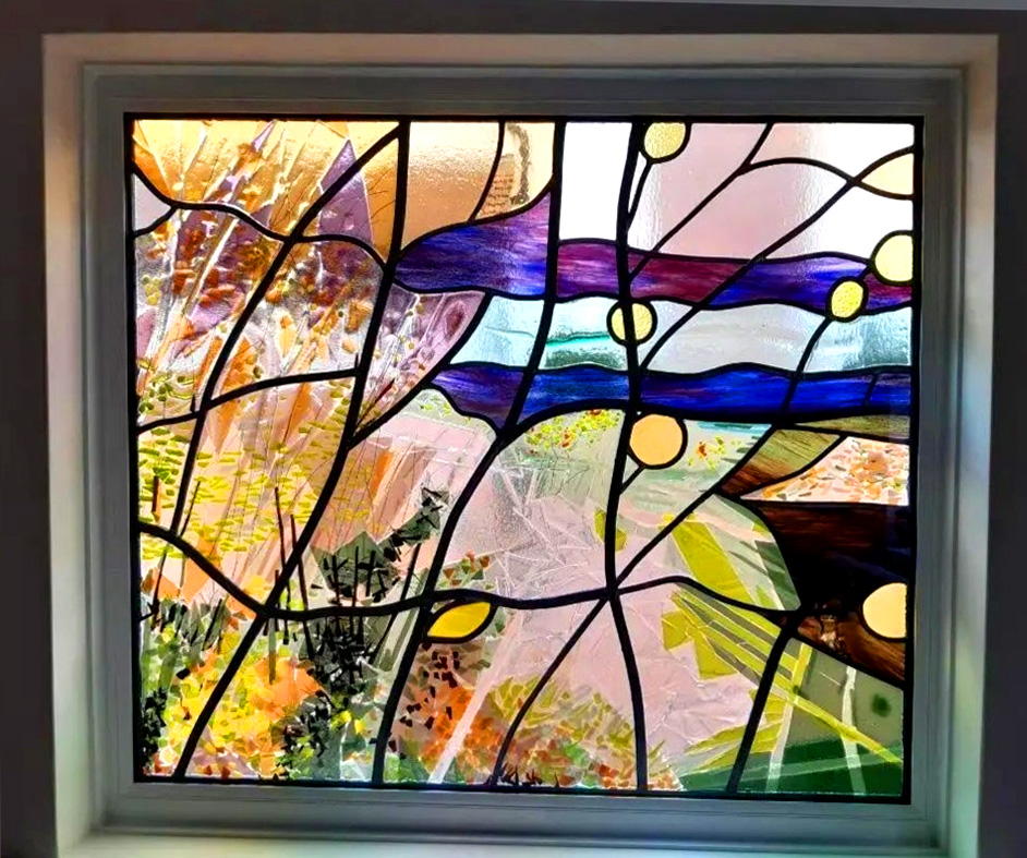  Colourful stained glass window, flowing abstract geometric landscape,  by Glass Artist Jill Fordham 